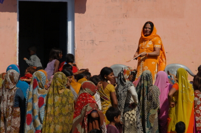 Dr Mishra giving health education to village women